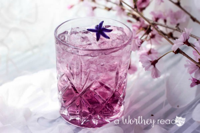 The Purple Rain Cocktail- dubbed after the late Prince Nelson Rogers. This cocktail is not only a pretty purple, but with Viniq Shimmering Liqueur and Stolichnaya Elit, you can't go wrong. Planning a Prince party? Be sure the purple rain is being served at the bar.
