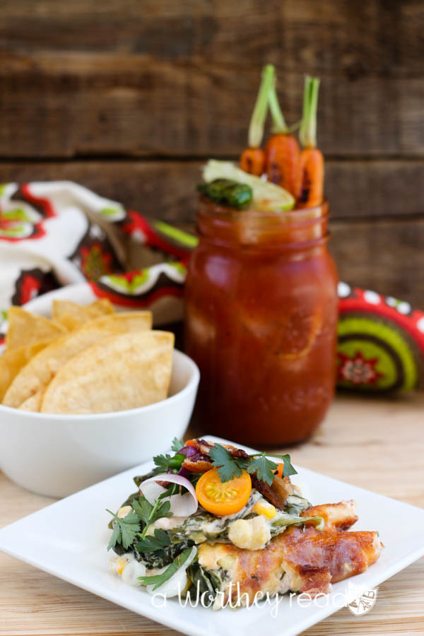 Hot Spinach & Sweet Corn Dip with Bacon Mini Salad & The Bloody Mary With Roasted Carrots & Pepper Cocktail. This combination packs a powerful punch of hot sauces, but not too hot. Dripping with cheesy goodness and dotted with fresh cut sweet corn off the cob, this easy appetizer is perfect for a game day appetizer or the upcoming holidays!