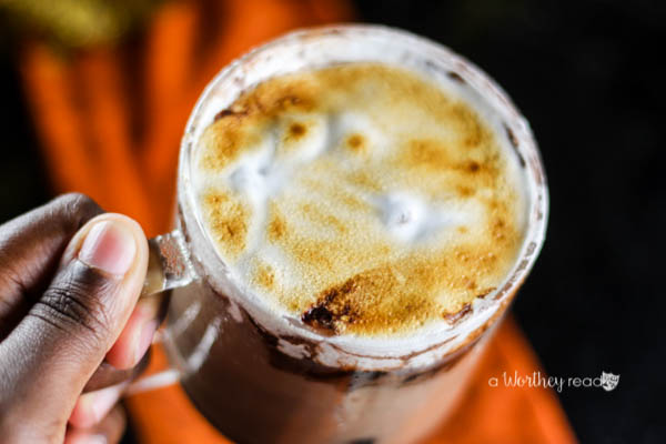 Curl up this fall with this delicious Pumpkin flavored hot chocolate. Pumpkin Spiced & Iced Cocoa with Roasted Marshmallow Creme