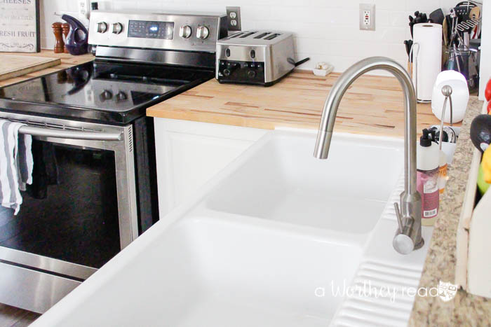 Get essential home cleaning hacks that will not only save you time, but money! Plus see how to renovate a small kitchen into a modern kitchen in our small house living series!