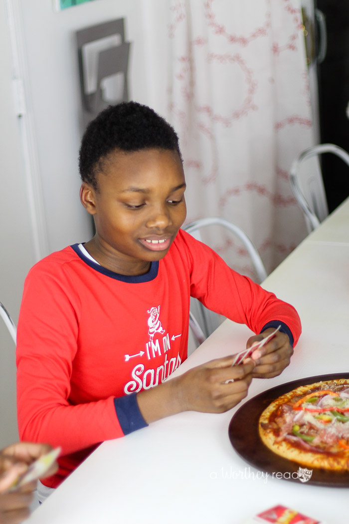 As kids grow older, they may not always want to do things with their parents. If you're struggling to find ways to engage your teens in game night, I'm sharing tips on engaging your teens. Family Game night is a great way to put down the devices and engage the whole family into connecting with each other.