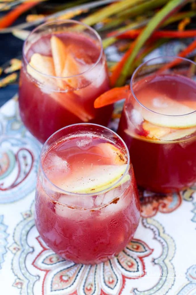Mix up a batch of our Fall Fruit Sangria and enjoy so many of autumn's favorite fall flavors. It's mixed with&nbsp;slices of sweet apples, ripe plums, peaches, and a mix of slightly bubbly Rosé and delicious apple cider. The whole thing is sweetened with our homemade Blueberry + Cranberry Simple Syrup.&nbsp;