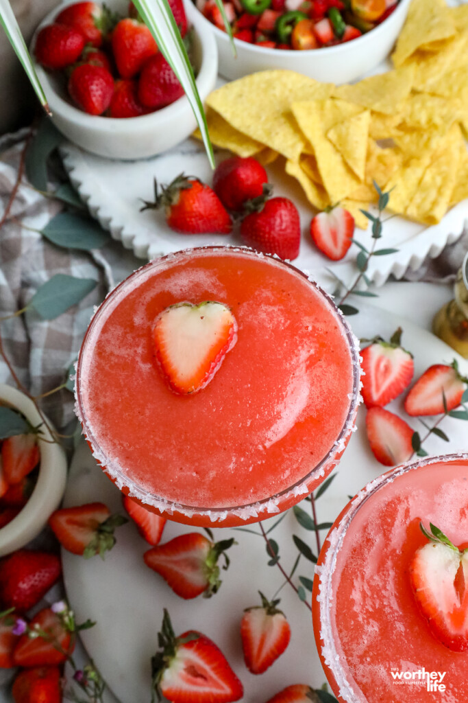 frozen strawberry margarita in a margarita glass