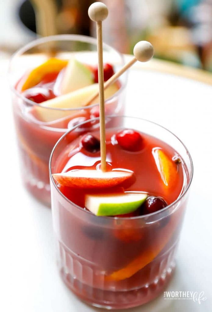 A warm spice sangria mocktail is a great way to keep the chill off this winter. Plus, it's an easy non-alcoholic sangria recipe made in the Instant Pot. With fresh cranberries, apple cider, apples, orange juice, and other easy-to-add ingredients, this sangria is a great holiday mocktail to try this year.