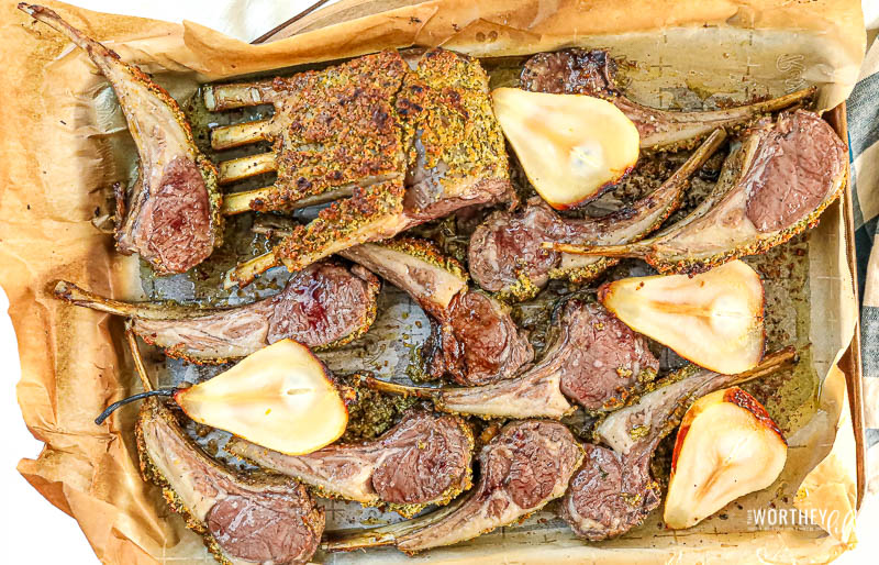 Garlic Parmesan Herb Crusted Lamb Rack on a sheet pan
