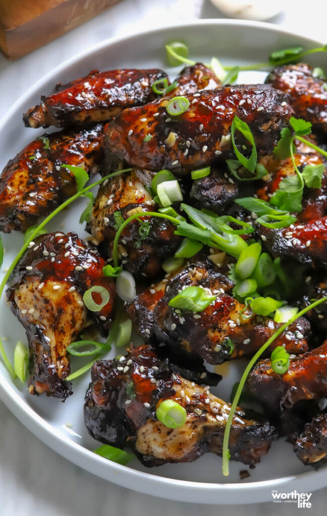 Thai chicken wings made with mushroom soy sauce have a darker look and a richer flavor.