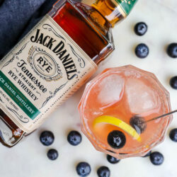 rye whiskey drink with fresh blueberries