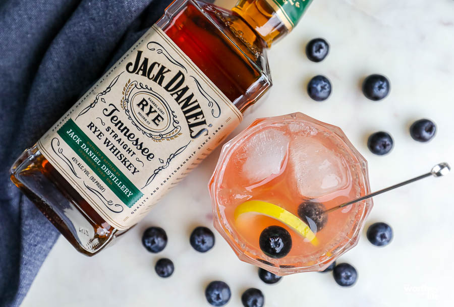 rye whiskey drink with fresh blueberries