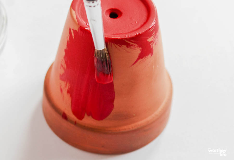 painting the terra cotta red