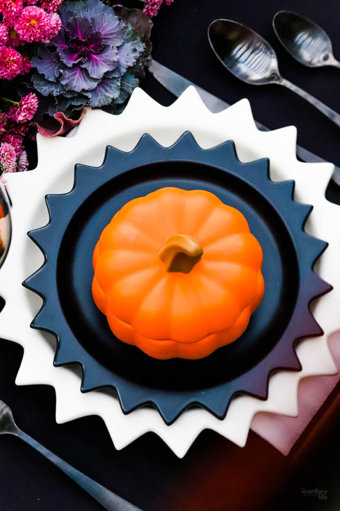 pumpkin ramekin on sun black plate
