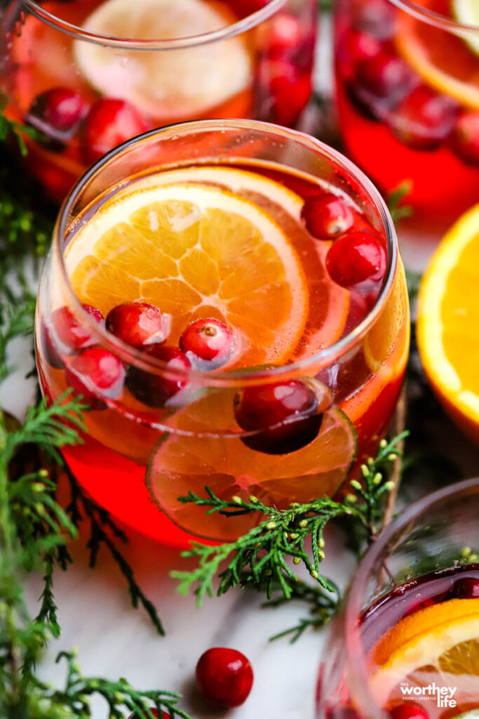 glass filled with juice and fresh fruit