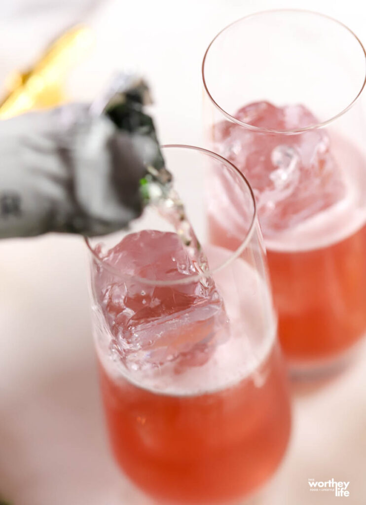 pouring champagne into glasses