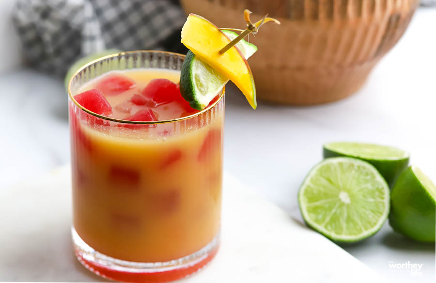 Our Mango Sour with a lime and mango garnish.