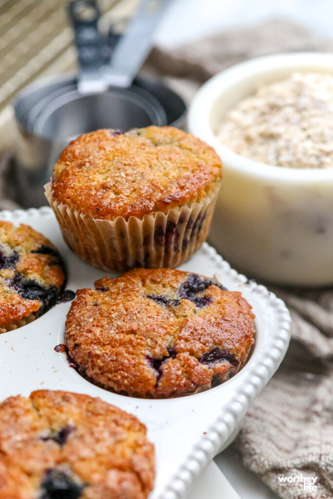 blueberry oatmeal muffins in cupcake white pan