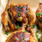 Cornish Hens on parchment paper