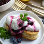 a summer dessert with berries, whipped cream