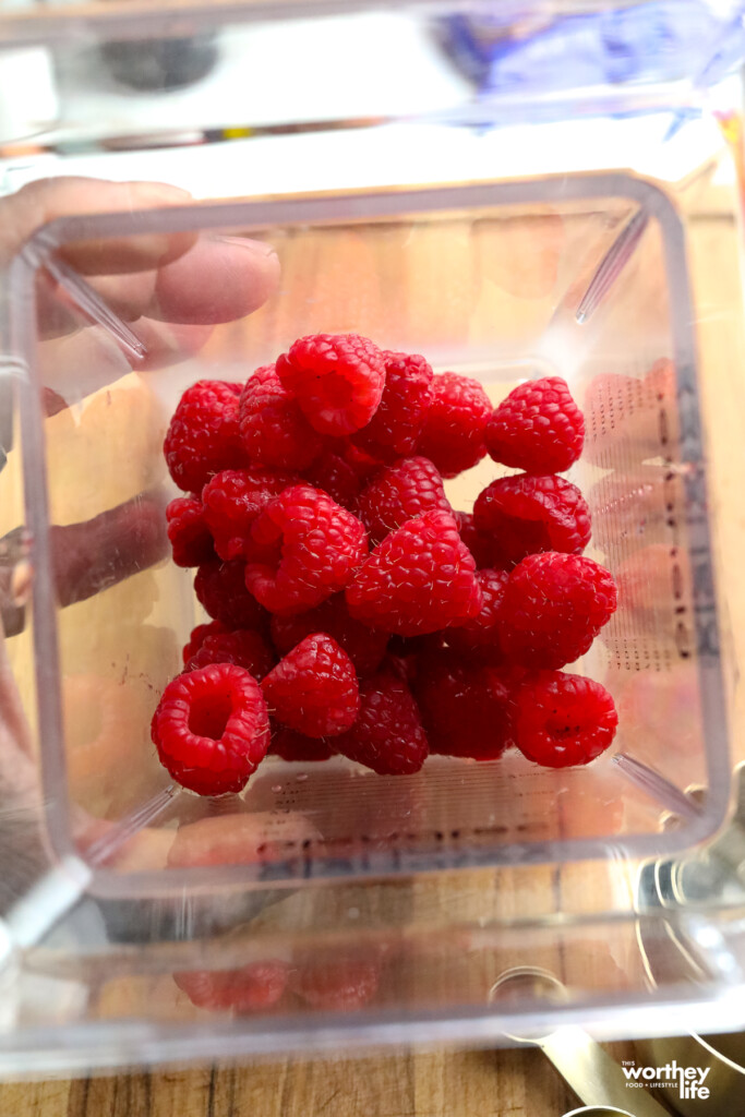 fresh raspberries in a blender to make a Raspberry Balsamic Vinaigrette