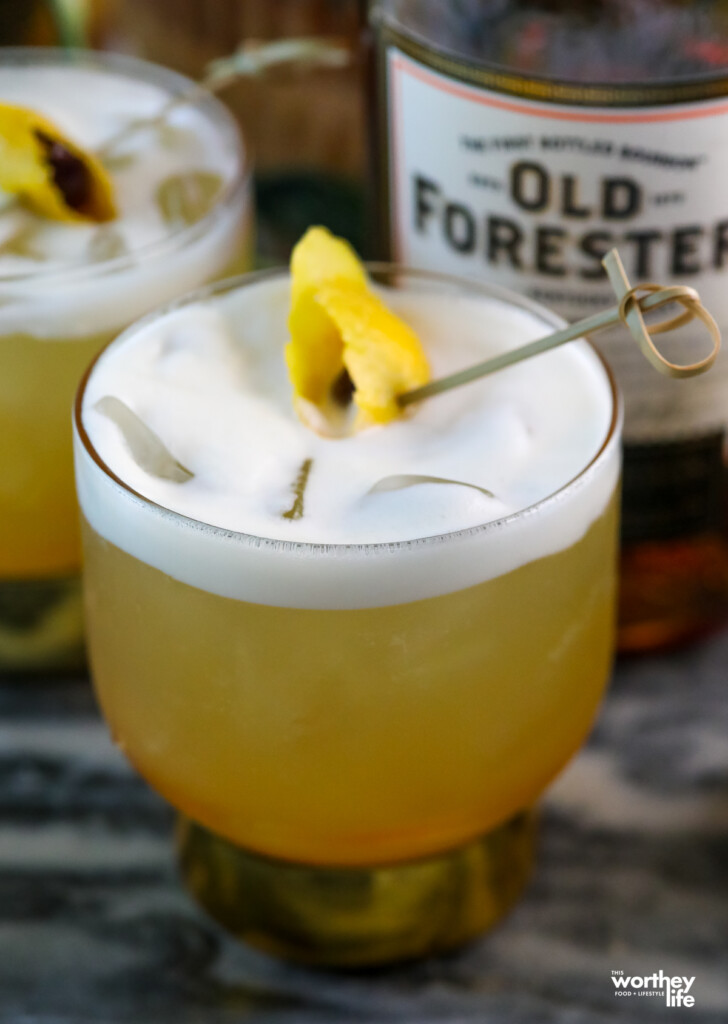 tropical pineapple whiskey sour cocktail