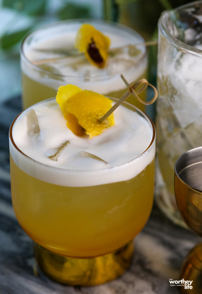 tropical pineapple whiskey sour cocktail