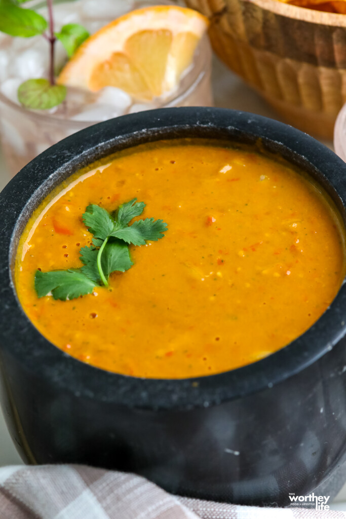 cherry tomato garden salsa in a black marble bowl