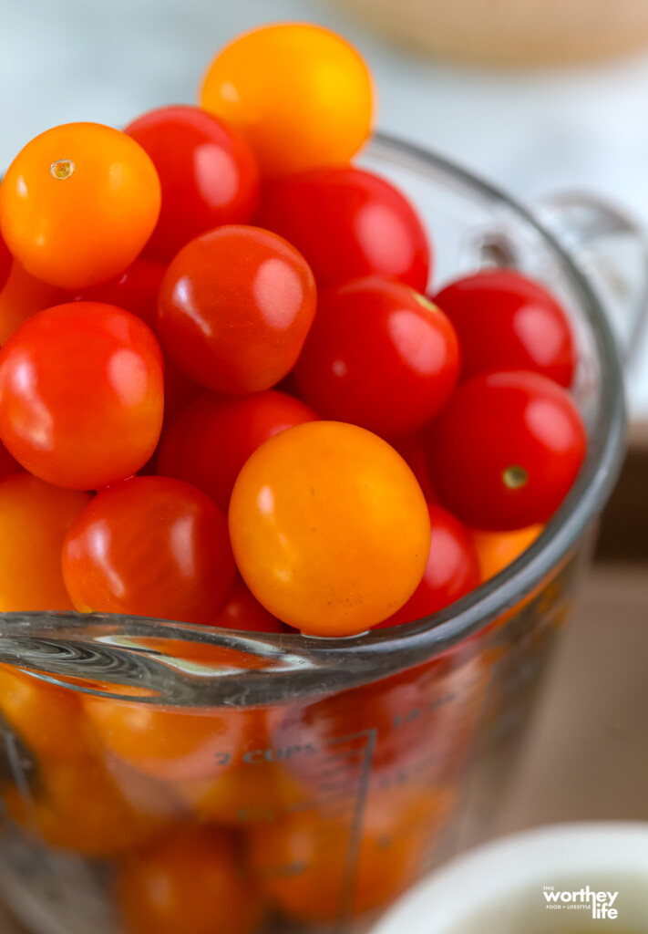 cherry tomatoes in a glass container