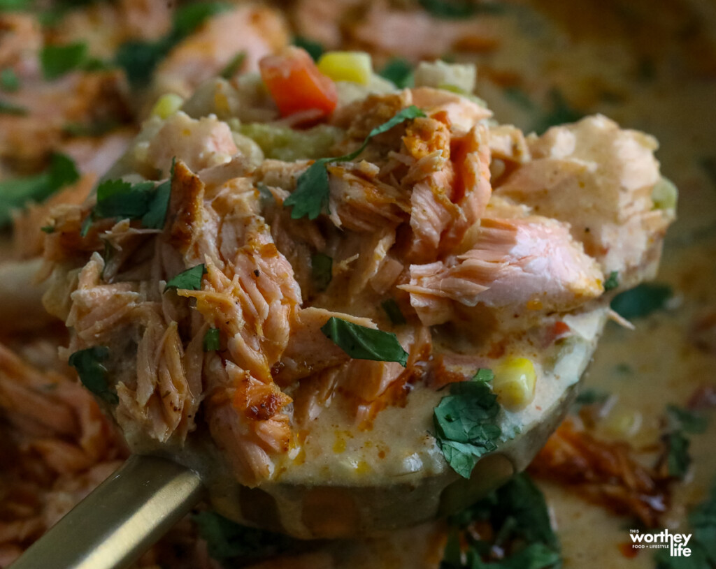 a cup full of Smoked White Salmon Chili
