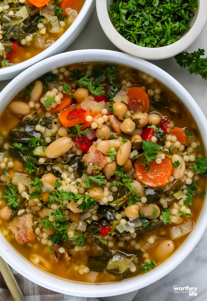 a colorful bowl of soup with Couscous Chickpea Cannellini Bean Soup