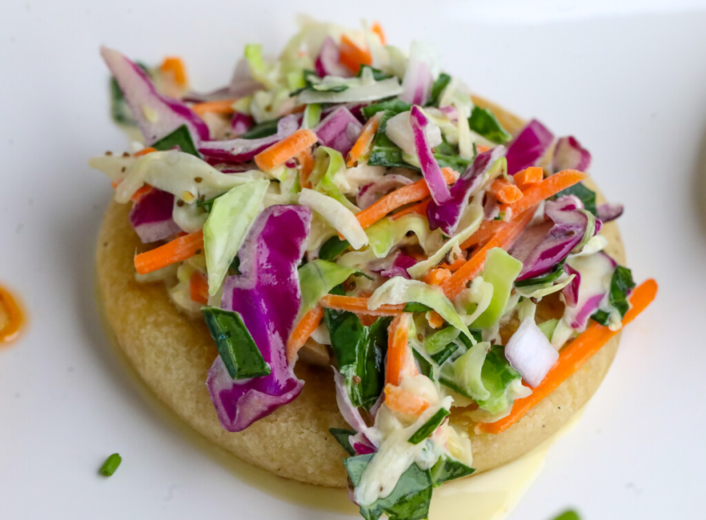 del real foods pupusas with collard coleslaw on top 