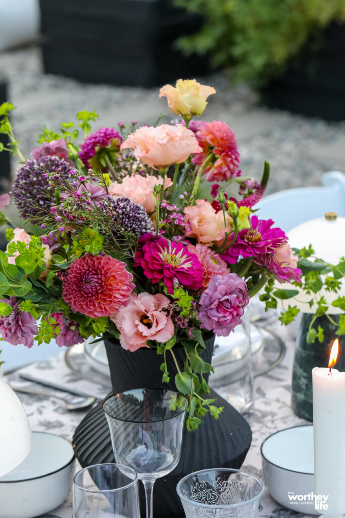 summer flowers in a vase: dahlias, zinnias, snapdragons