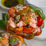 Salmon Tomato Bruschetta in a wavy glass