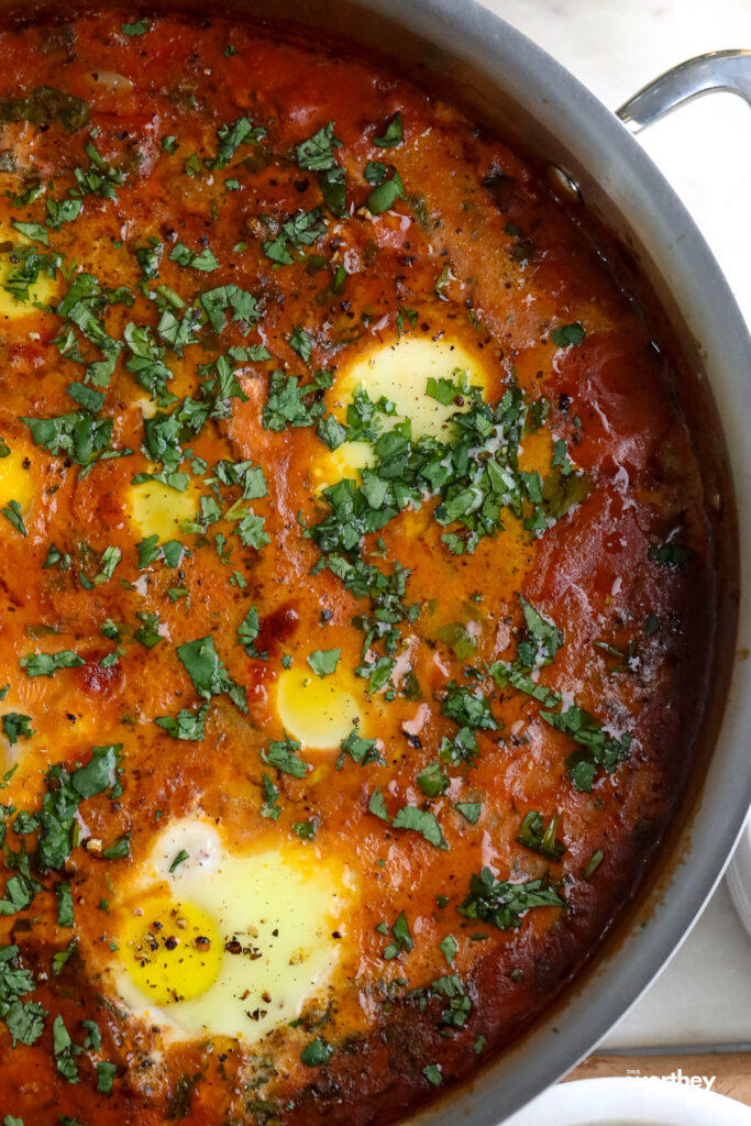a tomato based dish with lamb, eggs, and lots of flavor