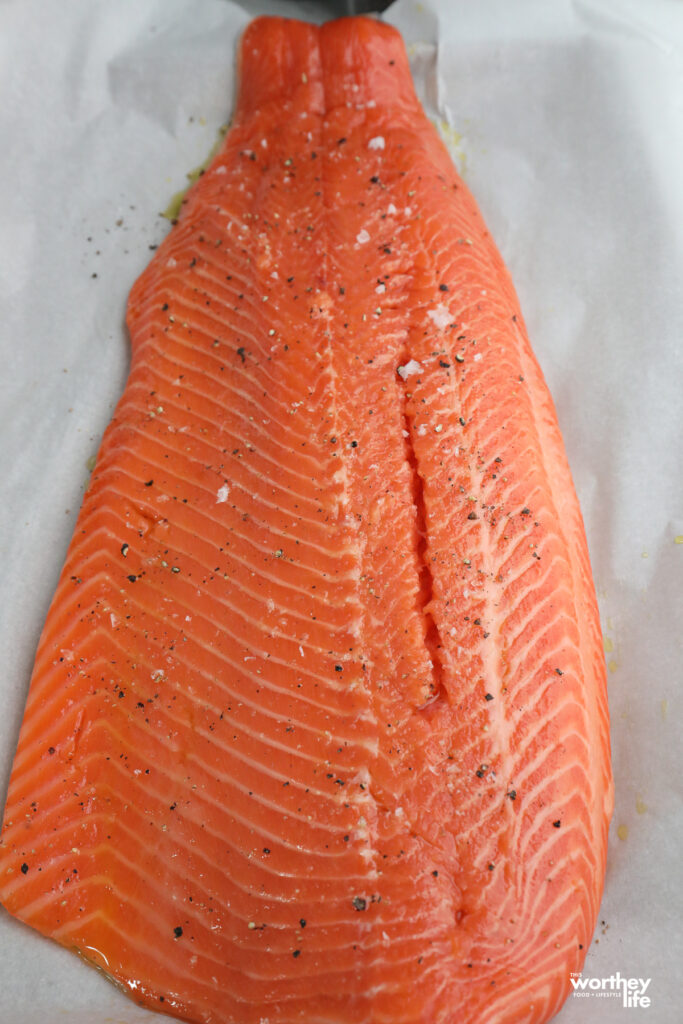 a slab of salmon on a baking sheet