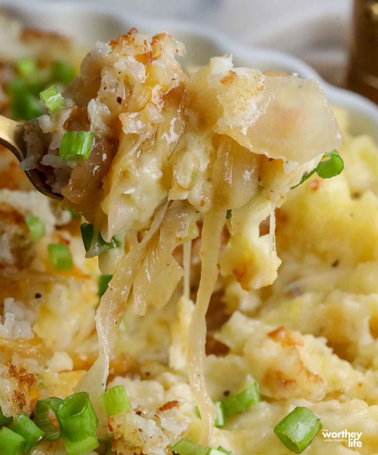 a spoonful of cheesy mashed potatoes